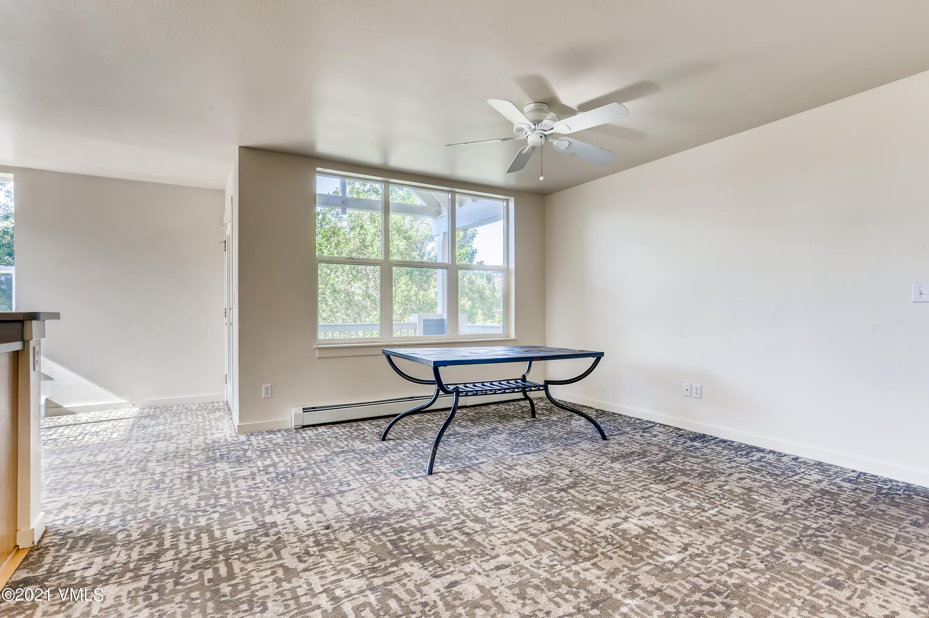 530 Founders Avenue, Unit A201 Eagle, CO 81631 - Photo 3 of 27 a view of a workspace with furniture and a window