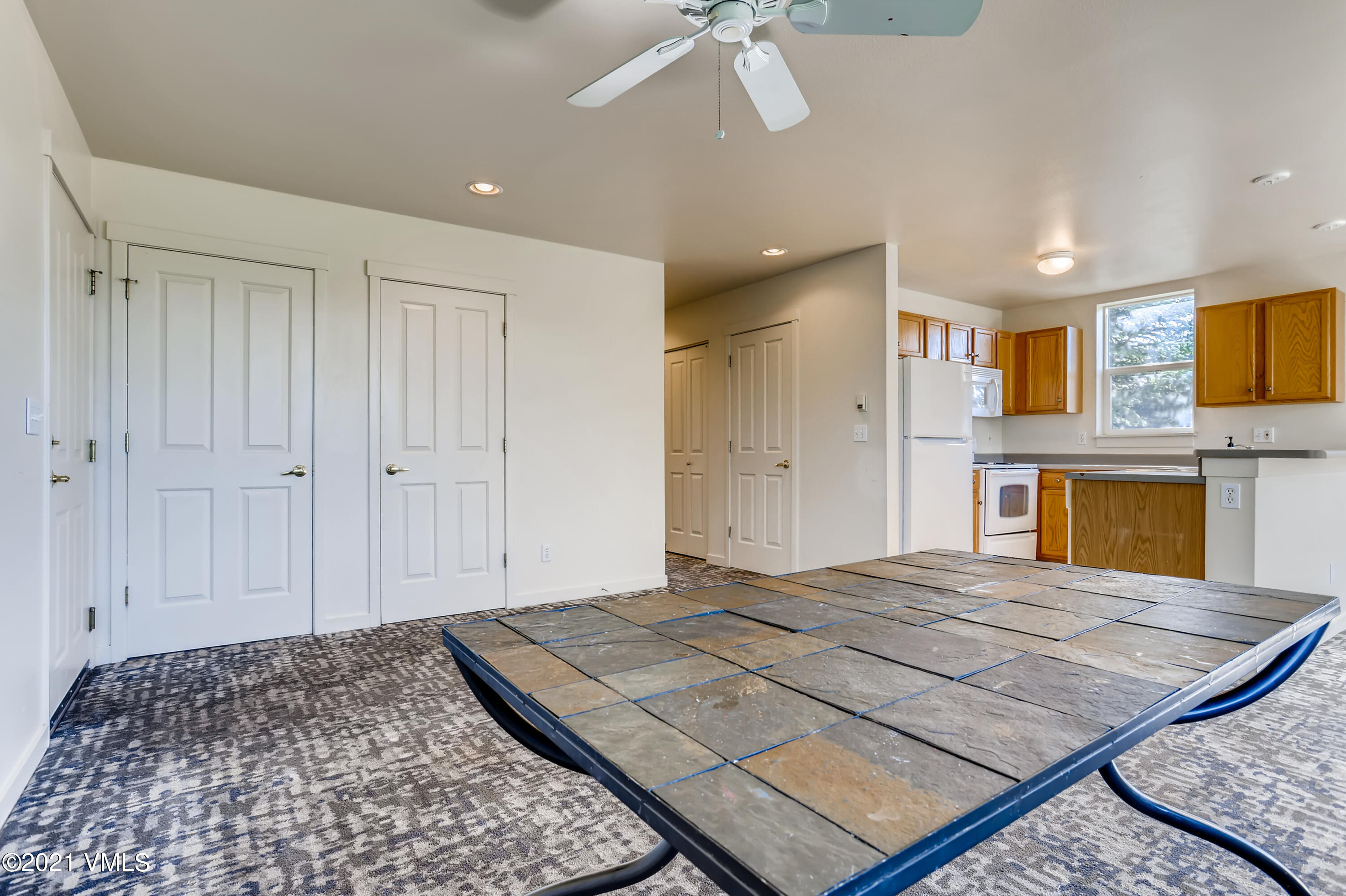 530 Founders Avenue, Unit A201 Eagle, CO 81631 - Photo 5 of 27 a bedroom with a bed and a fireplace