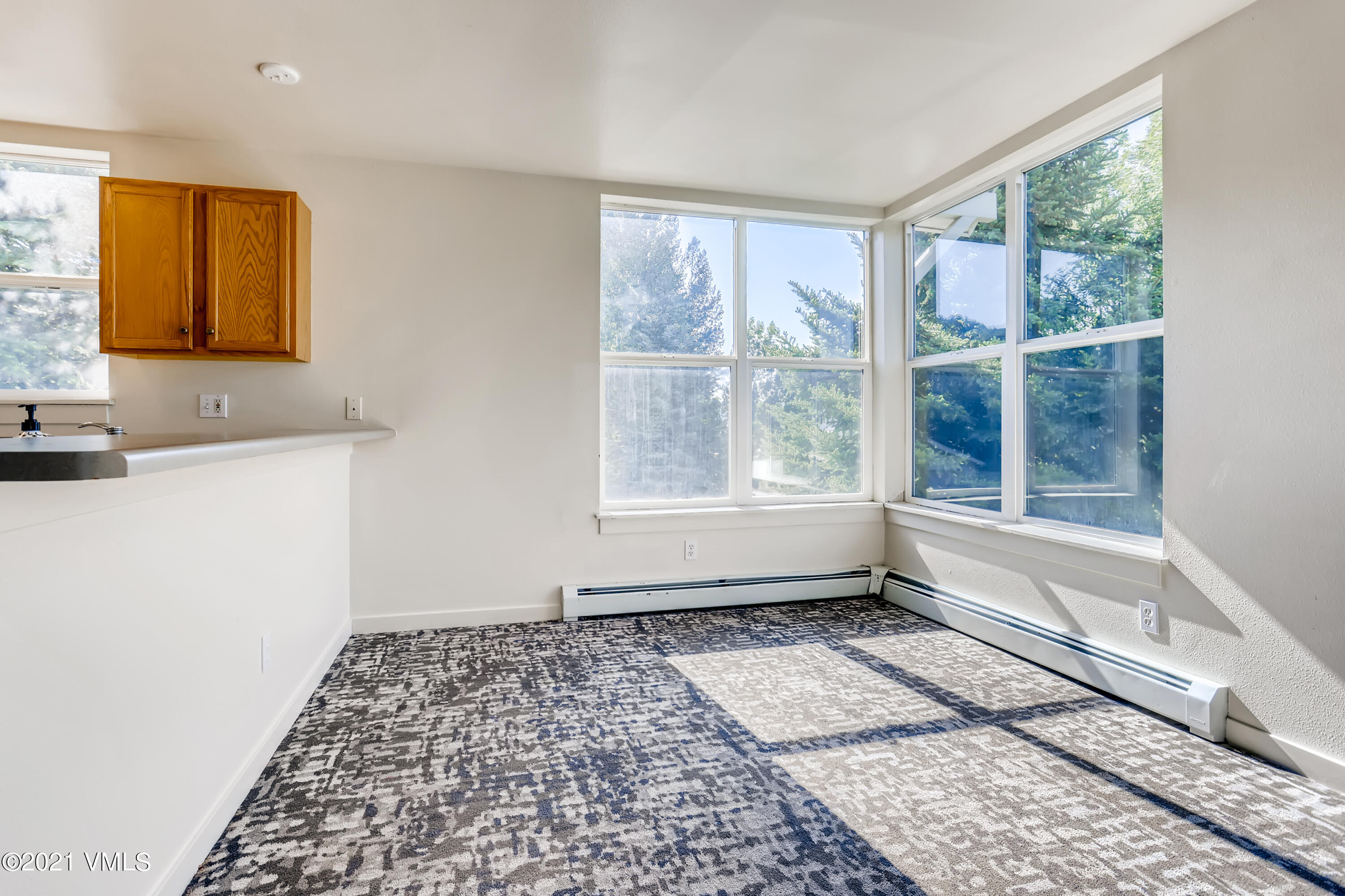 530 Founders Avenue, Unit A201 Eagle, CO 81631 - Photo 7 of 27 a bathroom with a window toilet and a bathtub