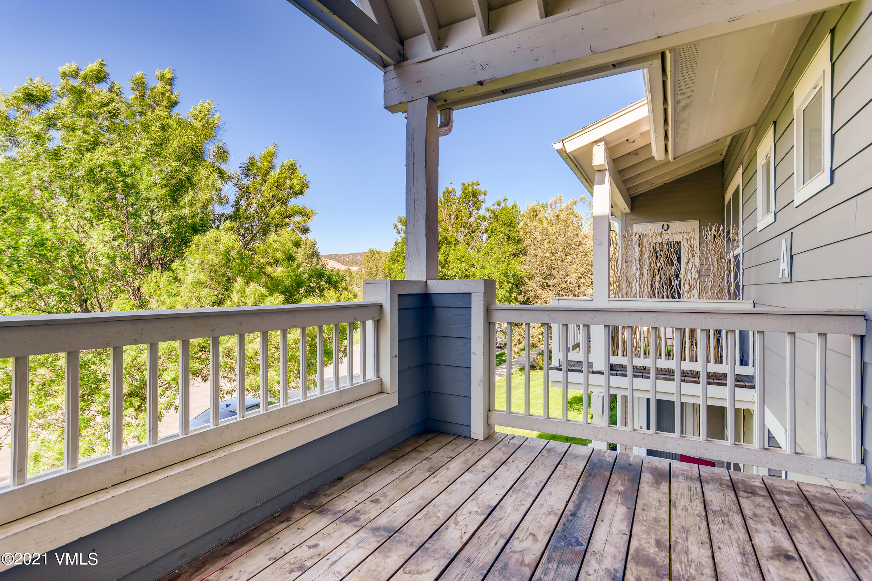 530 Founders Avenue, Unit A201 Eagle, CO 81631 - Photo 10 of 27 a view of a balcony with wooden floor