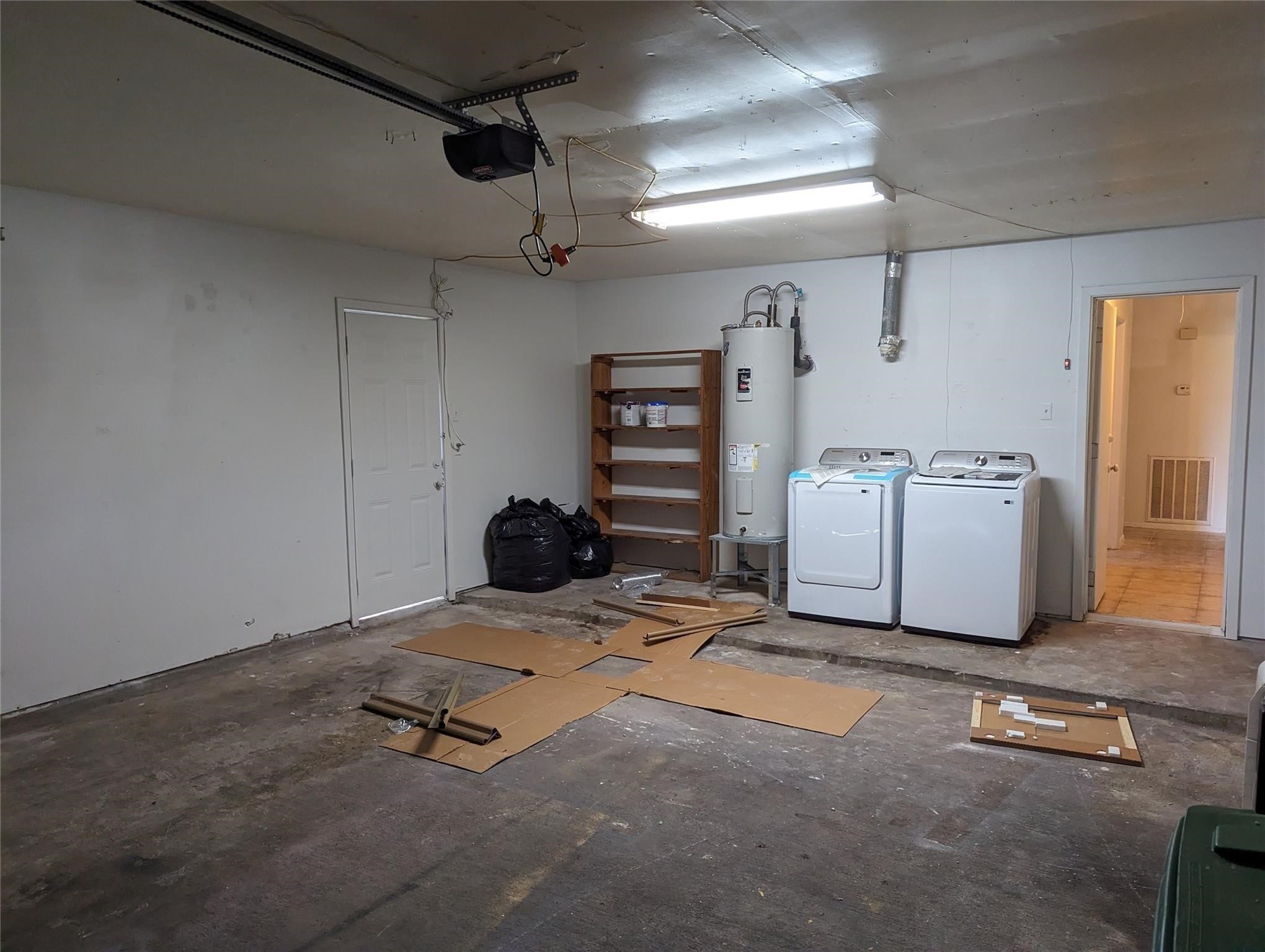 5150 Prairie Ridge Road Houston, TX 77053 - Photo 12 of 14 a room with storage and utility