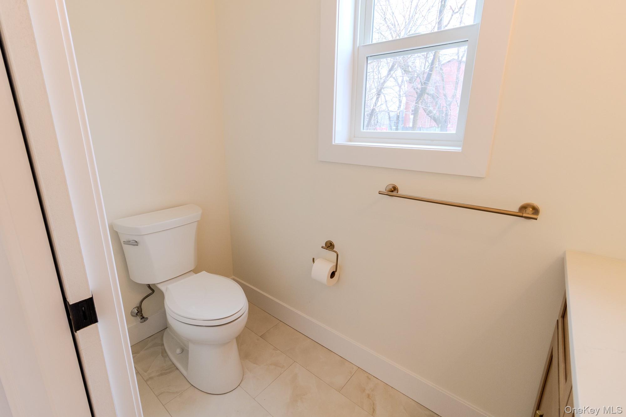 1 Ridge Avenue Port Jervis, NY 12771 - Photo 19 of 31 a white toilet sitting next to a window