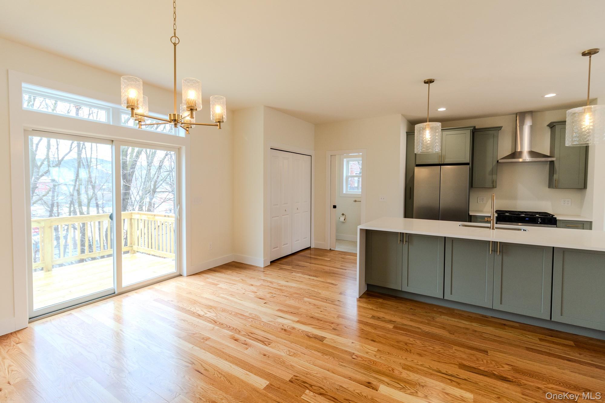 1 Ridge Avenue Port Jervis, NY 12771 - Photo 5 of 31 a view of a kitchen with a sink and wooden floor