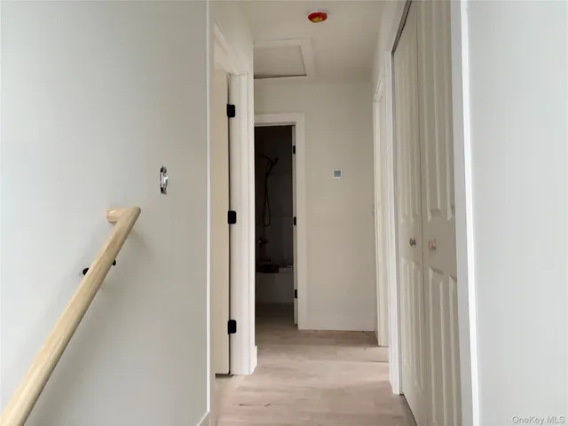 a view of an entryway with hallway