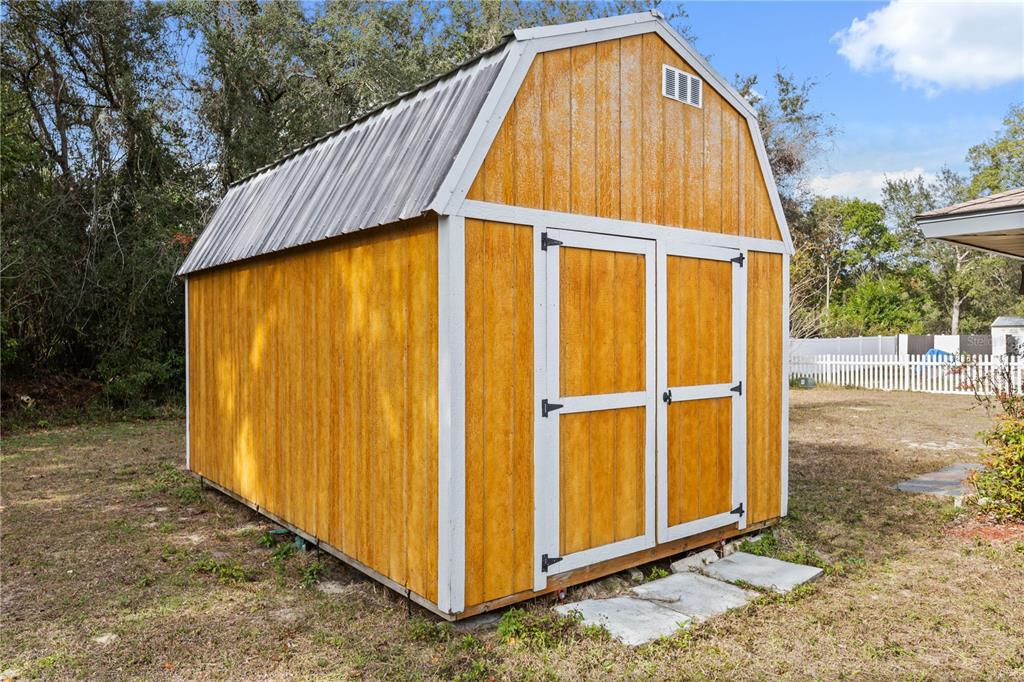 15218 Southwest 43rd Terrace Road Ocala, FL 34473 - Photo 26 of 30 a view of outdoor space with swimming pool and backyard
