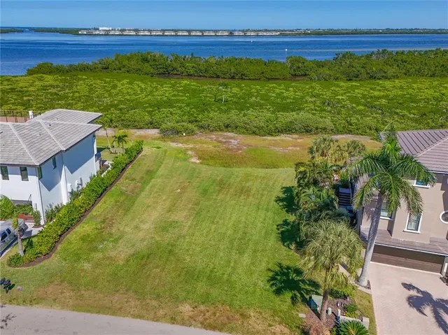 a view of a lake with a big yard
