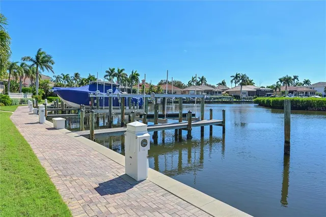 a view of a swimming pool with seating space