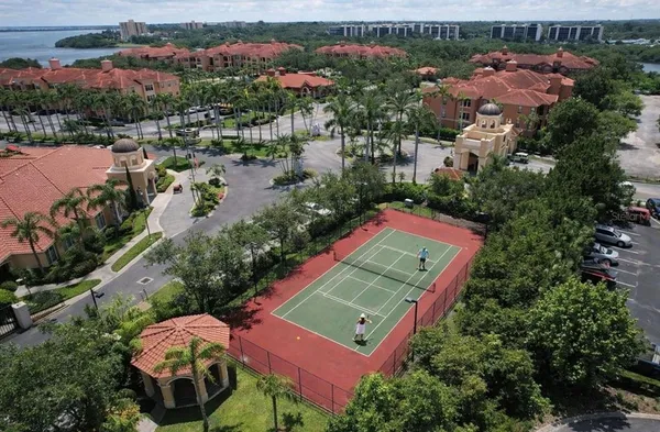 an aerial view of a swimming pool patio and mountain view