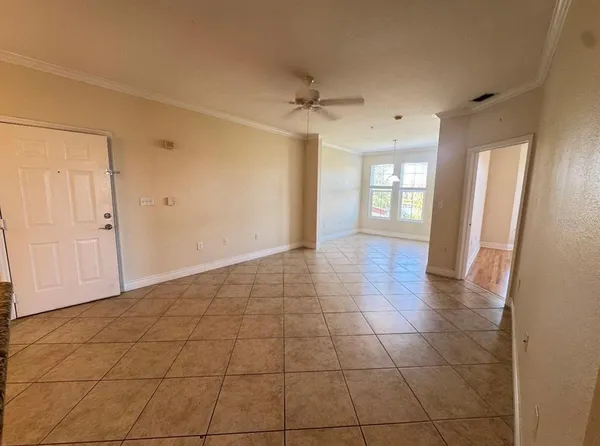 a view of an empty room and window