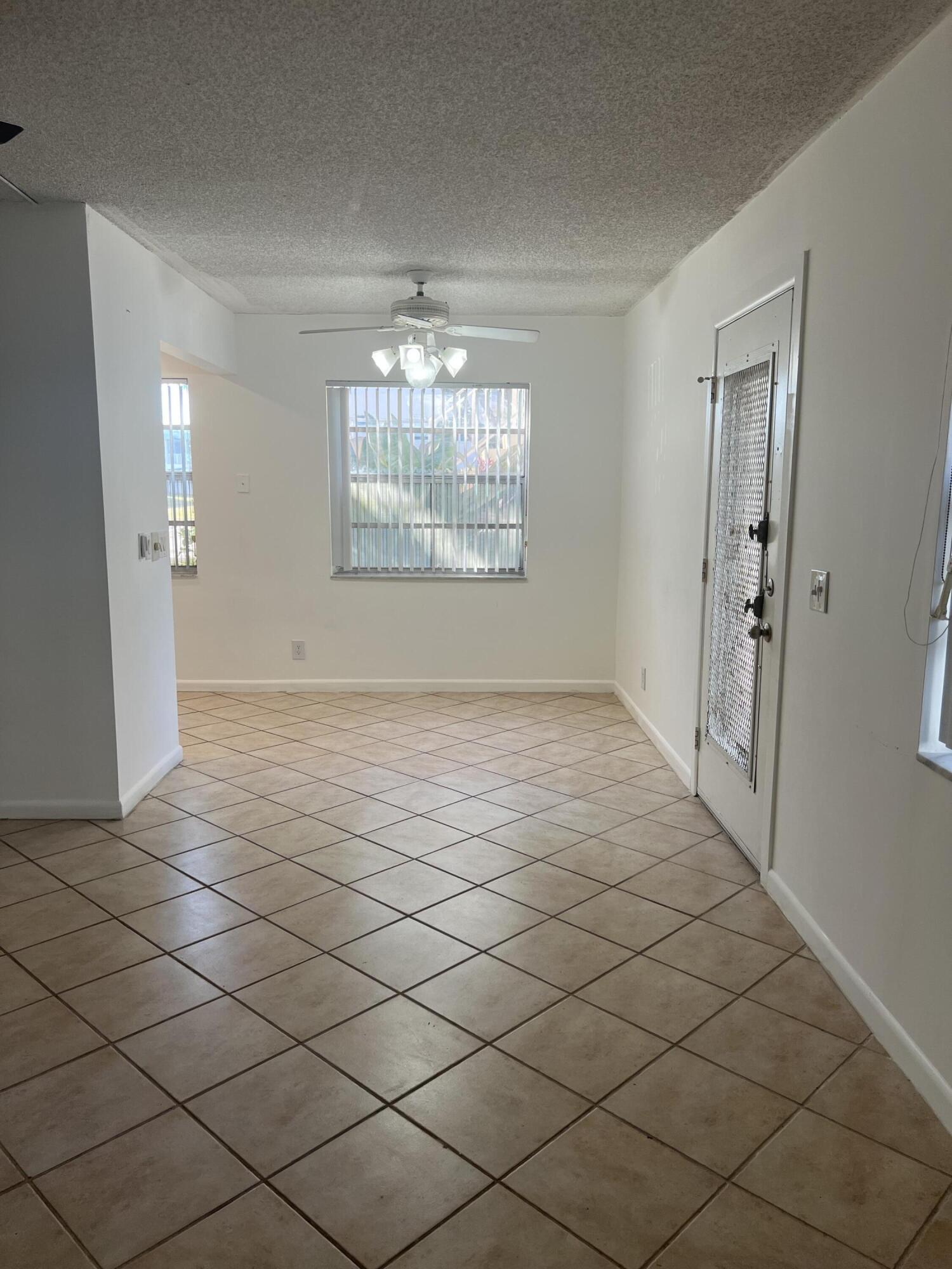 886 Flanders South Delray Beach, FL 33484 - Photo 17 of 41 a view of an empty room and window