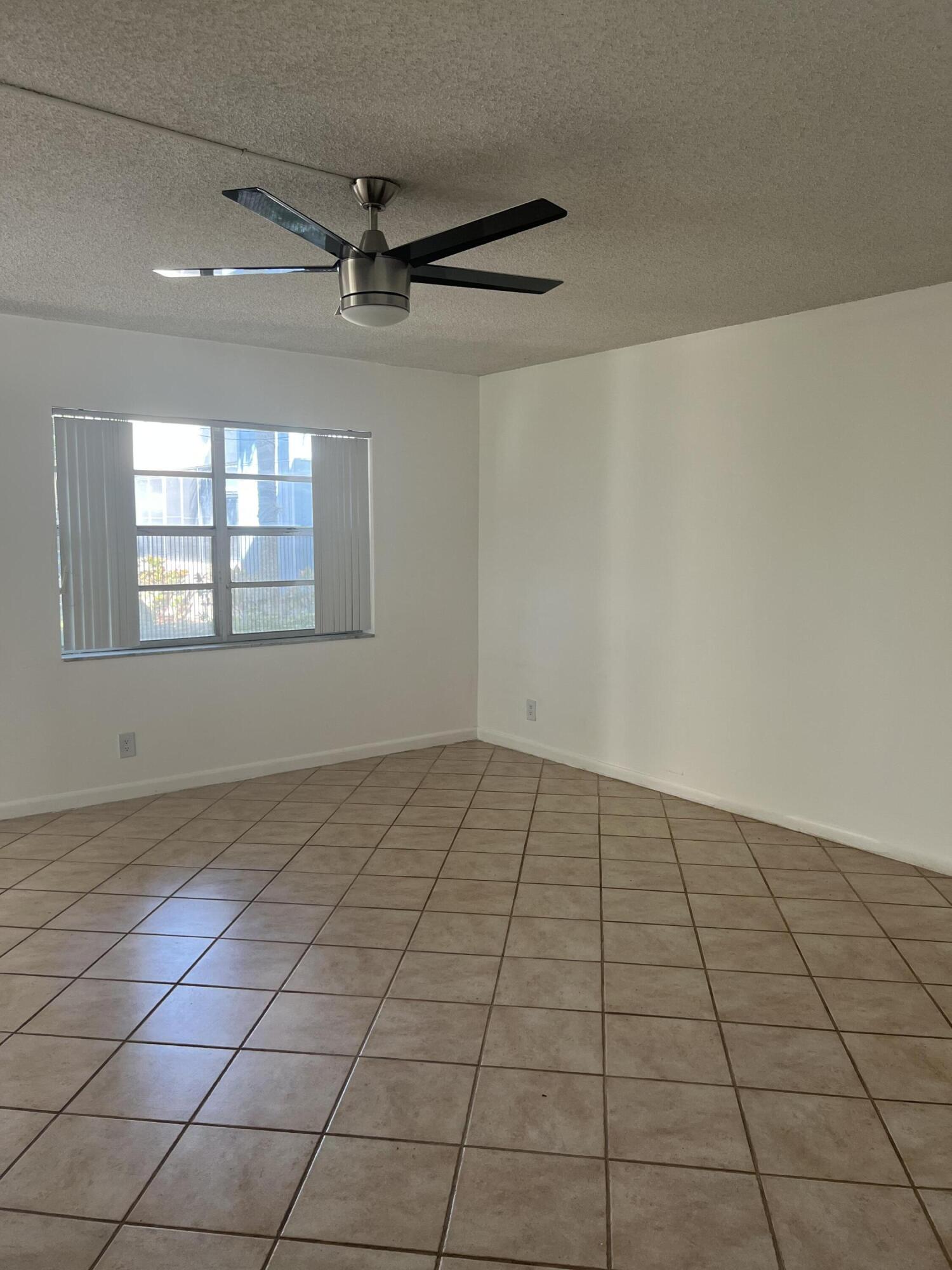 886 Flanders South Delray Beach, FL 33484 - Photo 10 of 41 a view of an empty room and window