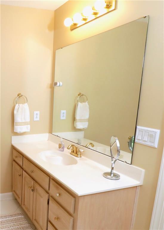 12522 Hawks Ridge Road Huntersville, NC 28078 - Photo 22 of 30 a bathroom with a sink and a mirror