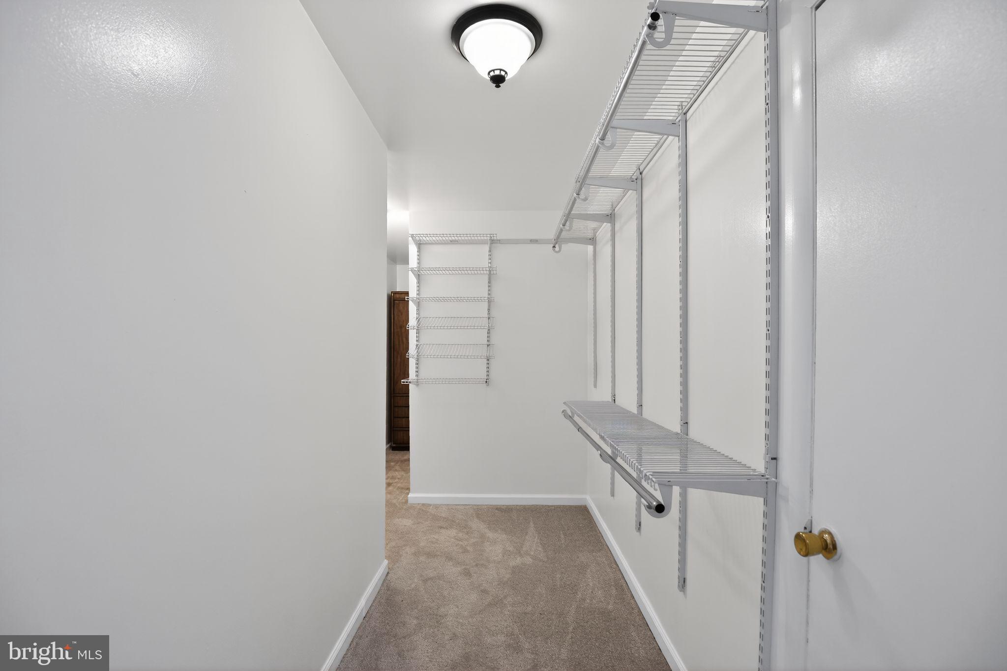 40855 Spring House Lane Leonardtown, MD 20650 - Photo 39 of 78 Upper Level 2, Prim. Walk-In Closet w/attic entry