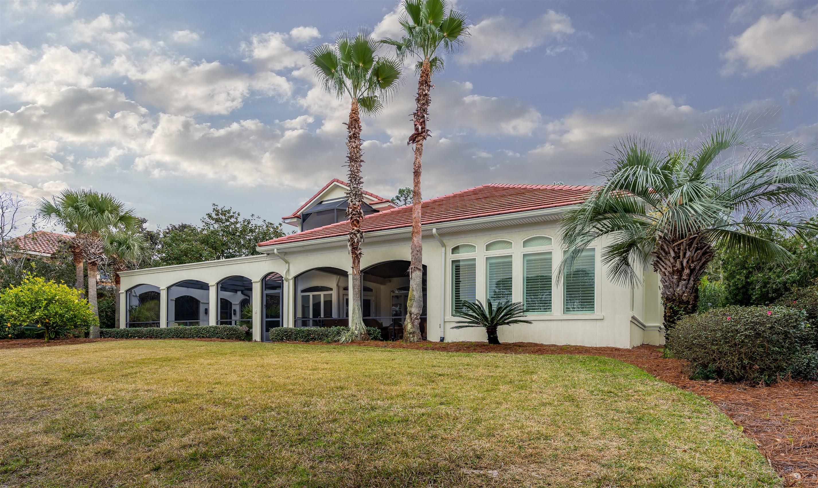 2949 Pine Valley Road Miramar Beach, FL 32550 - Photo 22 of 29 a front view of a house with garden