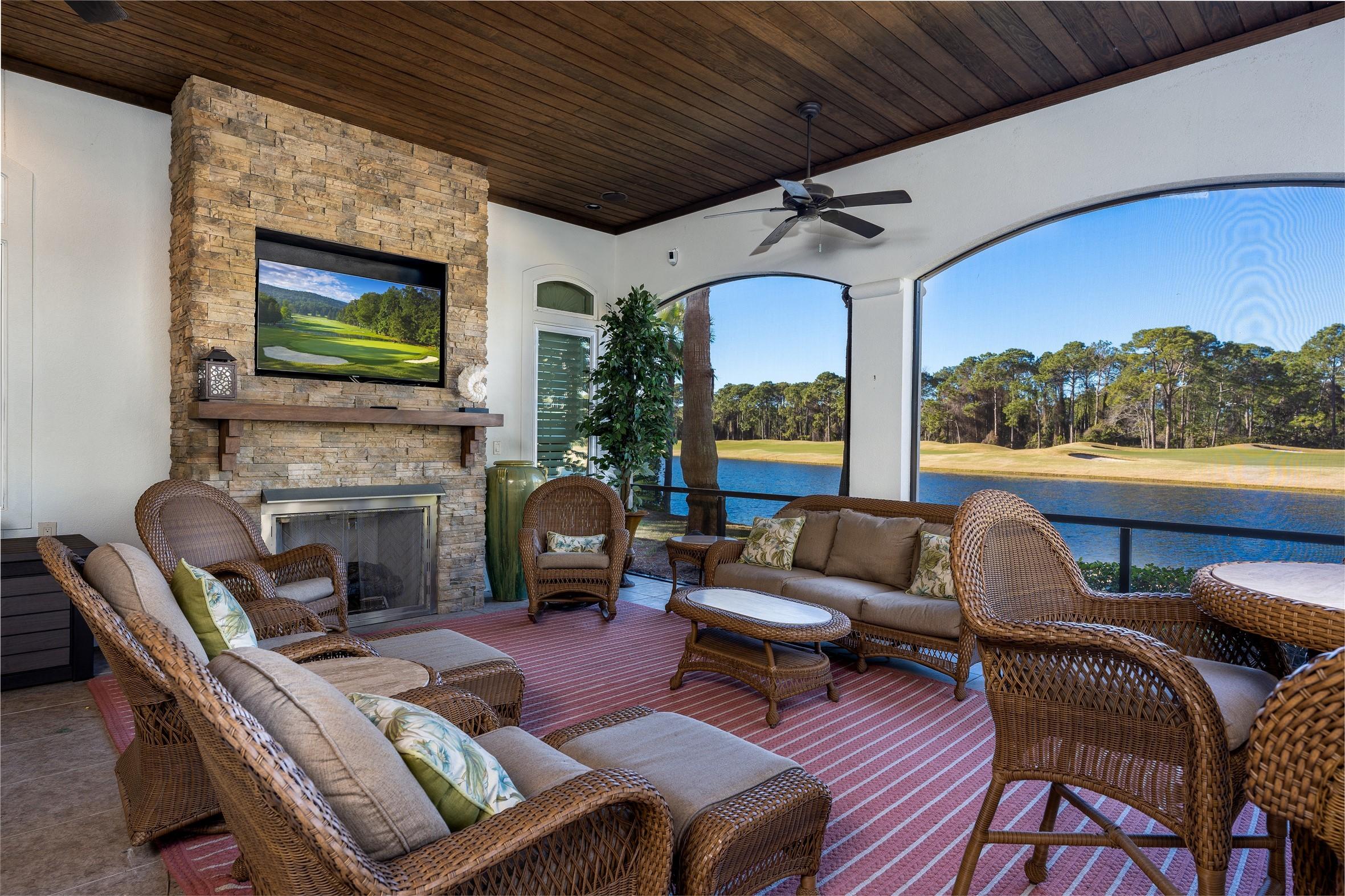 2949 Pine Valley Road Miramar Beach, FL 32550 - Photo 24 of 29 a living room with furniture a fireplace and a flat screen tv