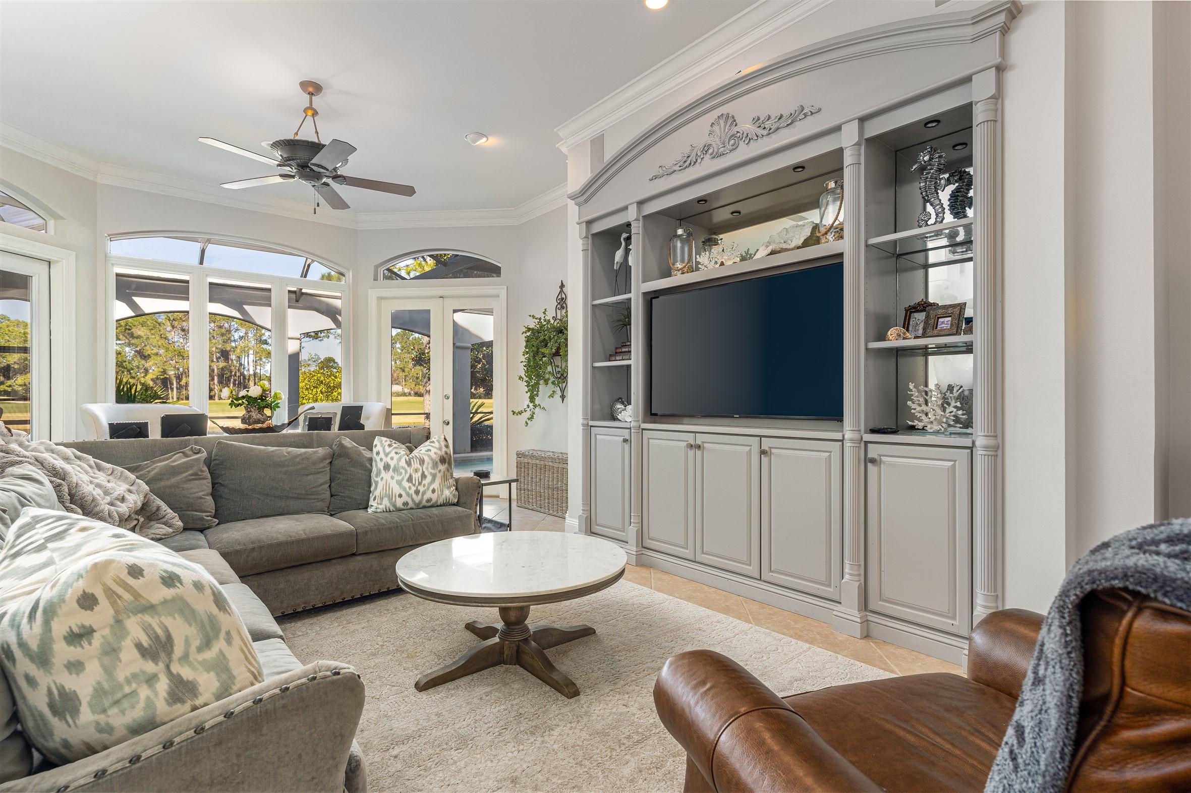 2949 Pine Valley Road Miramar Beach, FL 32550 - Photo 5 of 29 a living room with furniture and a flat screen tv