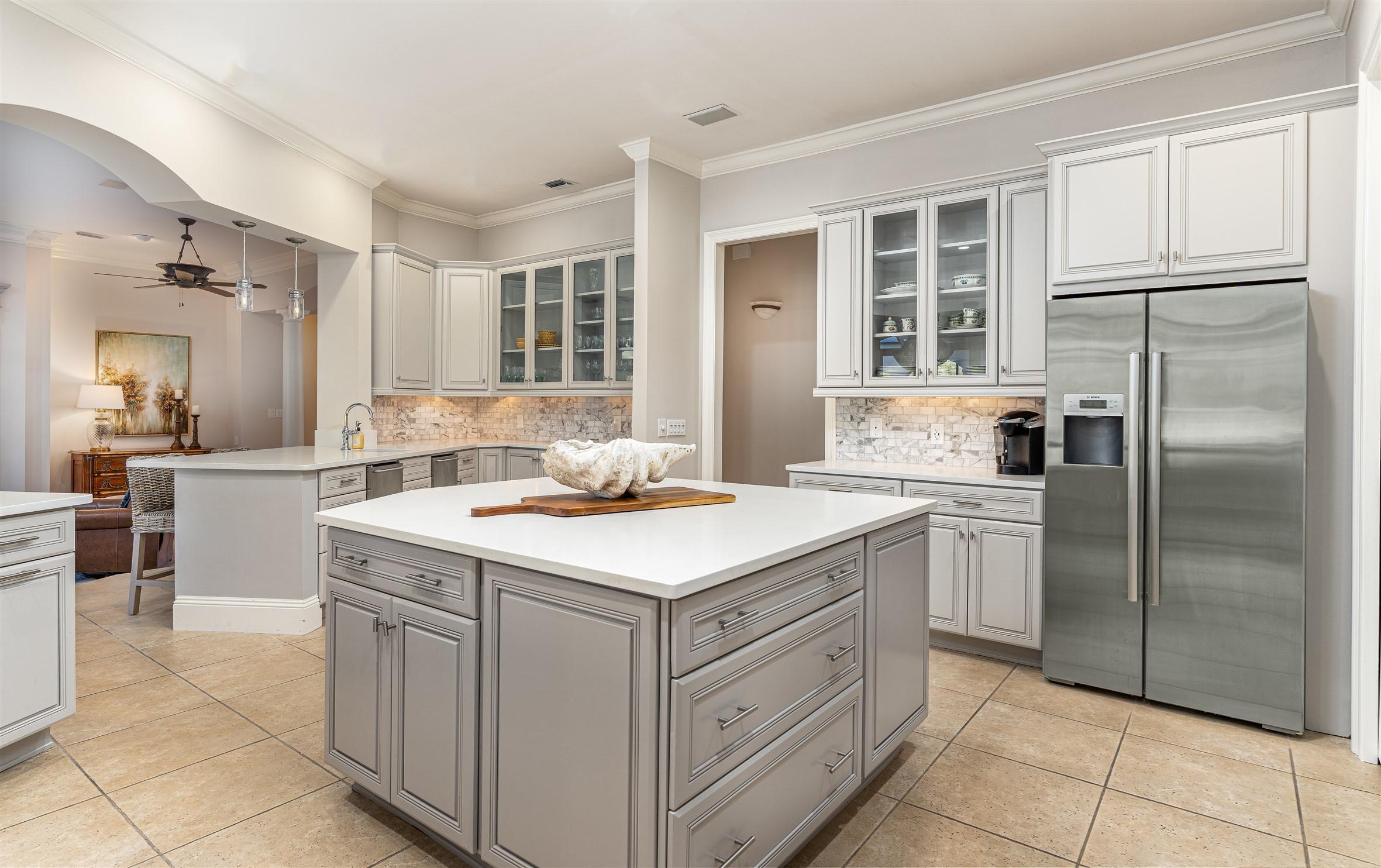 2949 Pine Valley Road Miramar Beach, FL 32550 - Photo 10 of 29 a kitchen with a sink stove and refrigerator