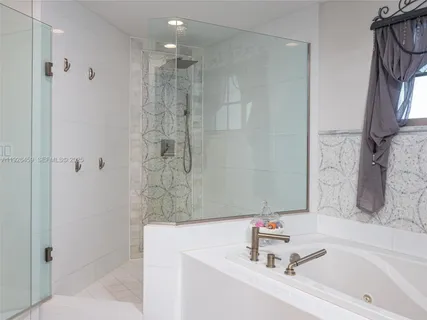 a bathroom with a sink and a shower