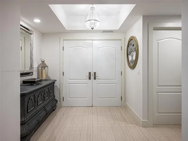 a view of a hallway with washer and dryer