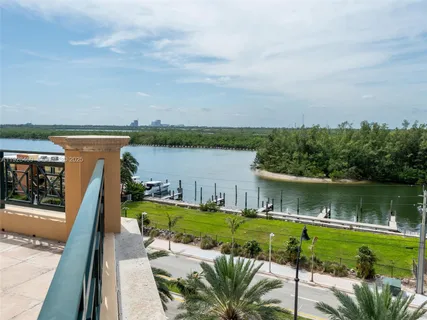 a view of a lake with a garden and lake view
