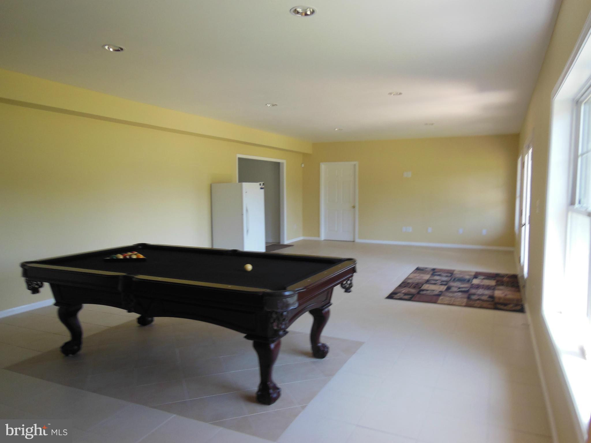 10366 Green Road Bealeton, VA 22712 - Photo 17 of 29 Rec Room tile flooring -Walk out