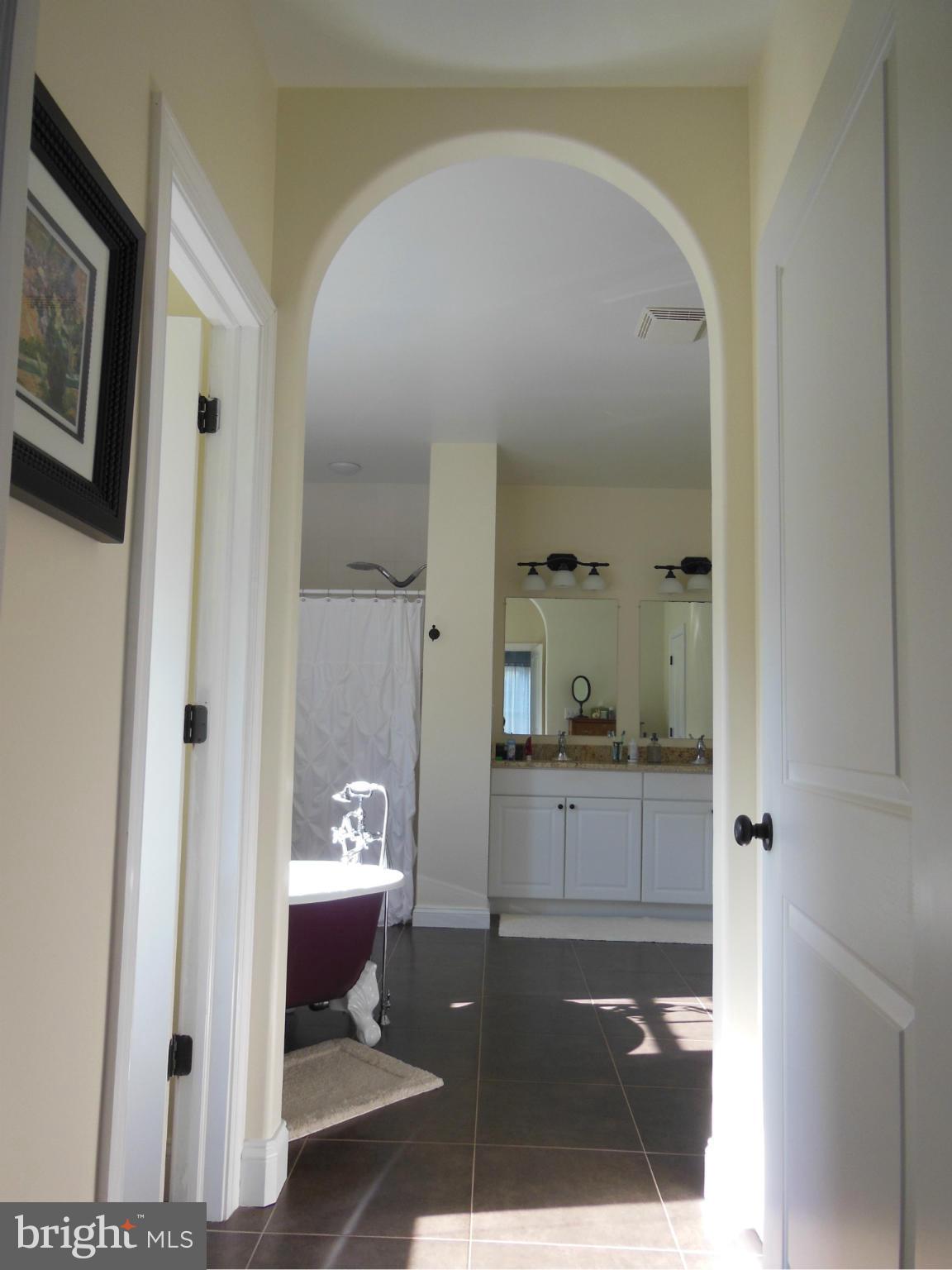 10366 Green Road Bealeton, VA 22712 - Photo 22 of 29 Arched doorway - granite double sink vanity