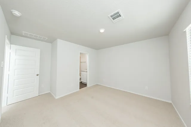 an empty room with closet