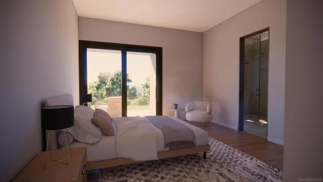 a living room with patio furniture and a flat screen tv