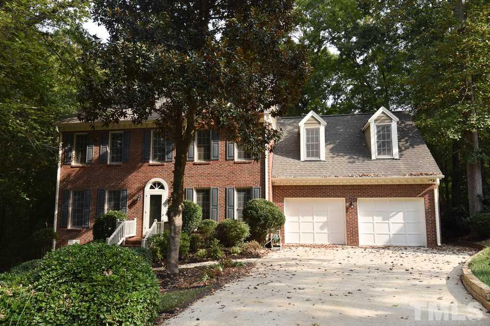 9004 Enfield Court Raleigh, NC 27615 - Photo 1 of 30 Updated, all brick 4BR/2.5BA/3229sf 2.5 story home on wooded .27 ac cul-de-sac lot in N. Raleigh's Woods Of Tiffany, w/pool & tennis, near I-540 for easy commuting.