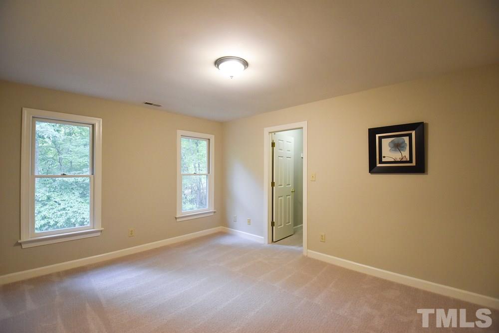 9004 Enfield Court Raleigh, NC 27615 - Photo 21 of 30 This is Bedroom 3.