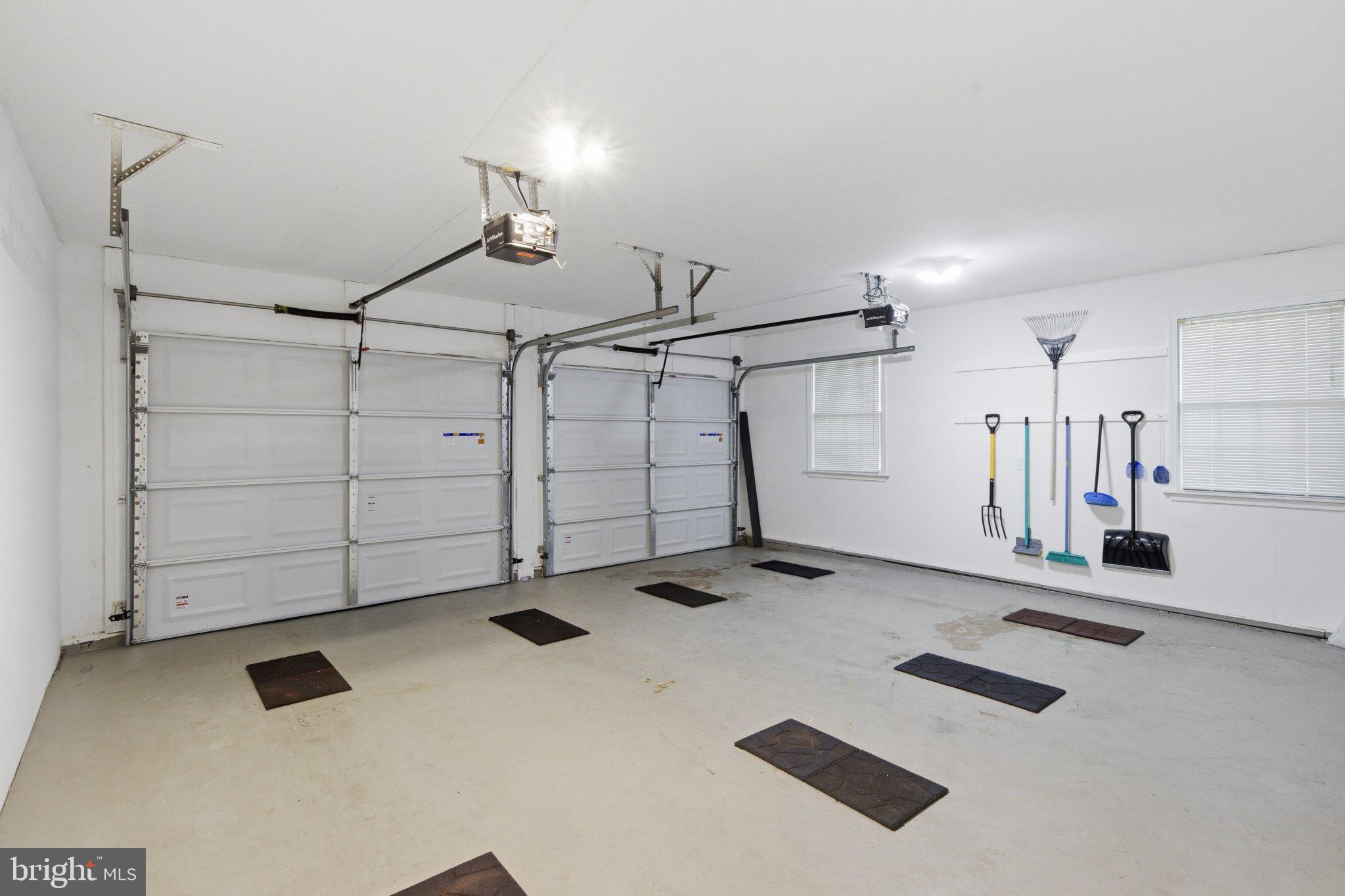 18310 Upper Beckleysville Road Hampstead, MD 21074 - Photo 43 of 67 Spacious garage with organized tools.