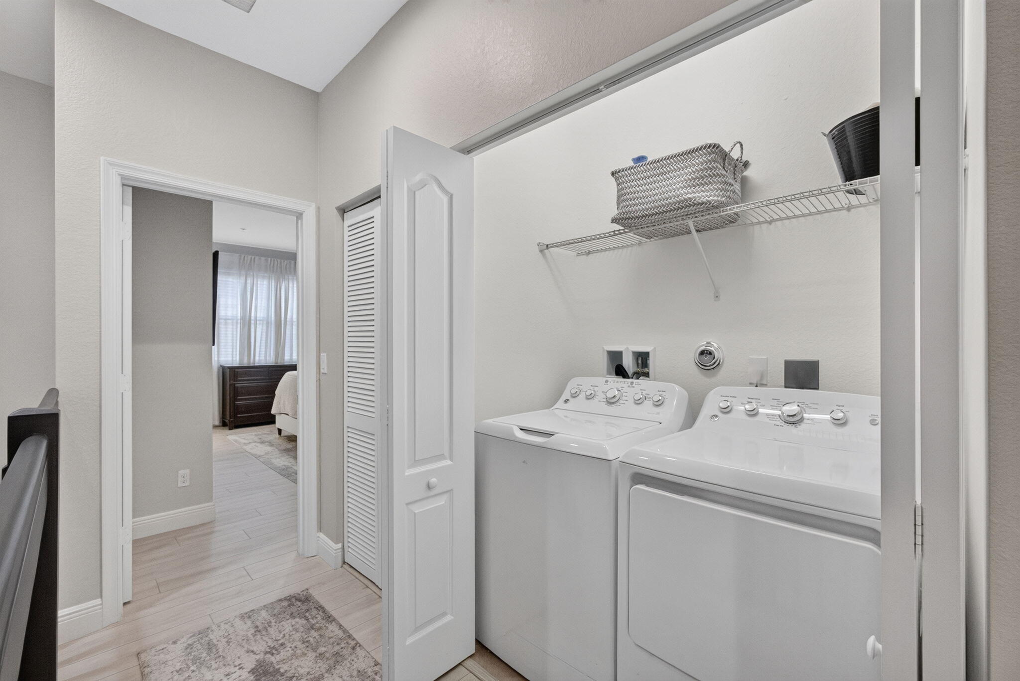 9523 Southwest Merlin Court Stuart, FL 34997 - Photo 17 of 43 LAUNDRY