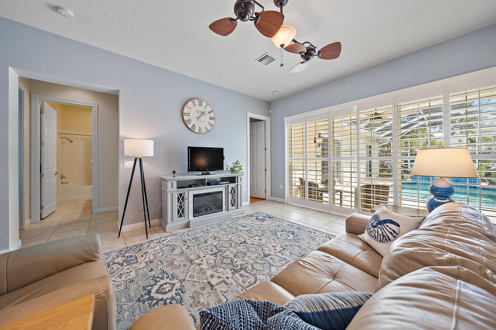 1174 Tropical Drive Jupiter, FL 33458 - Photo 12 of 49 Family Room/Living