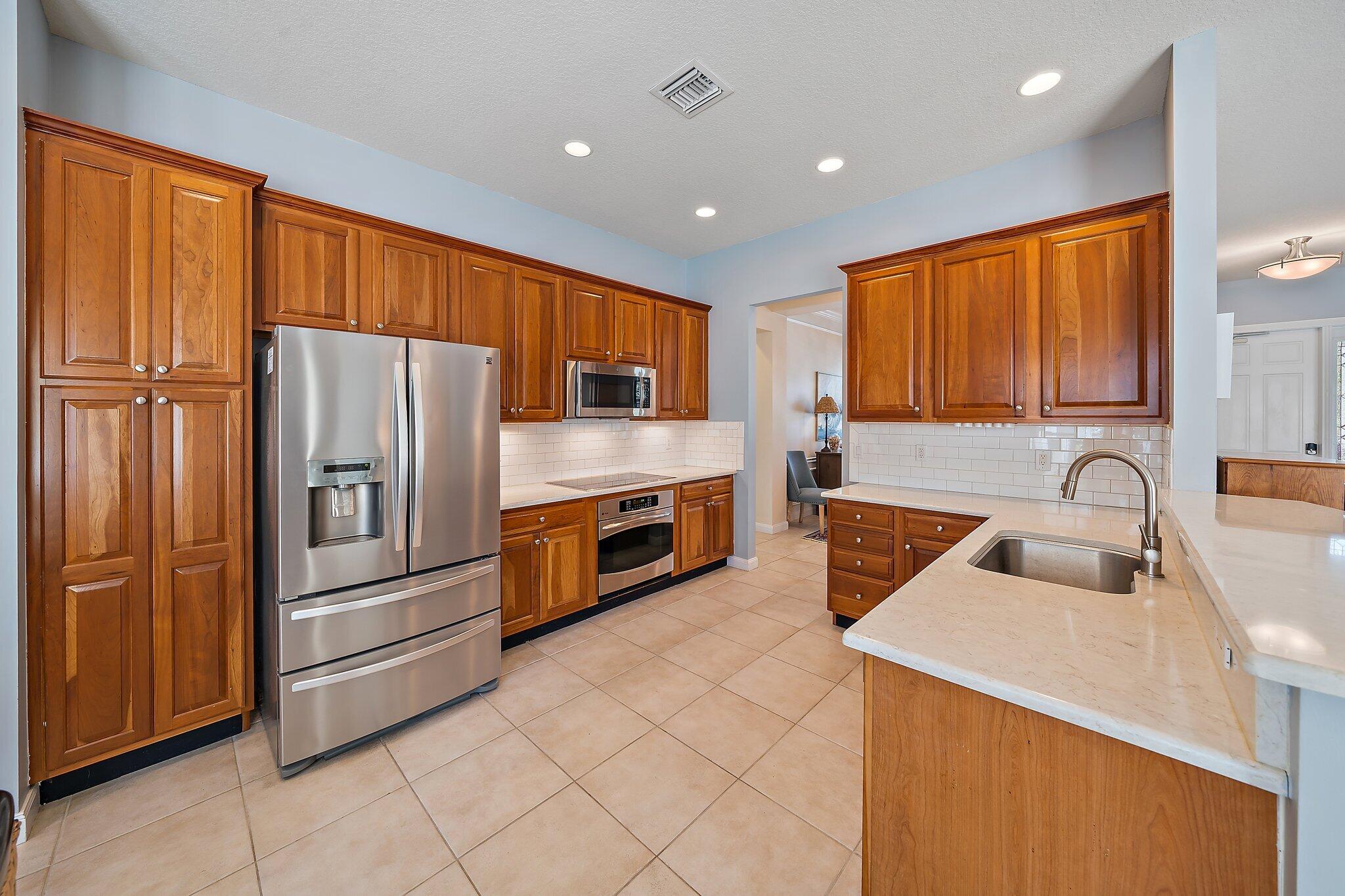 1174 Tropical Drive Jupiter, FL 33458 - Photo 15 of 49 Kitchen