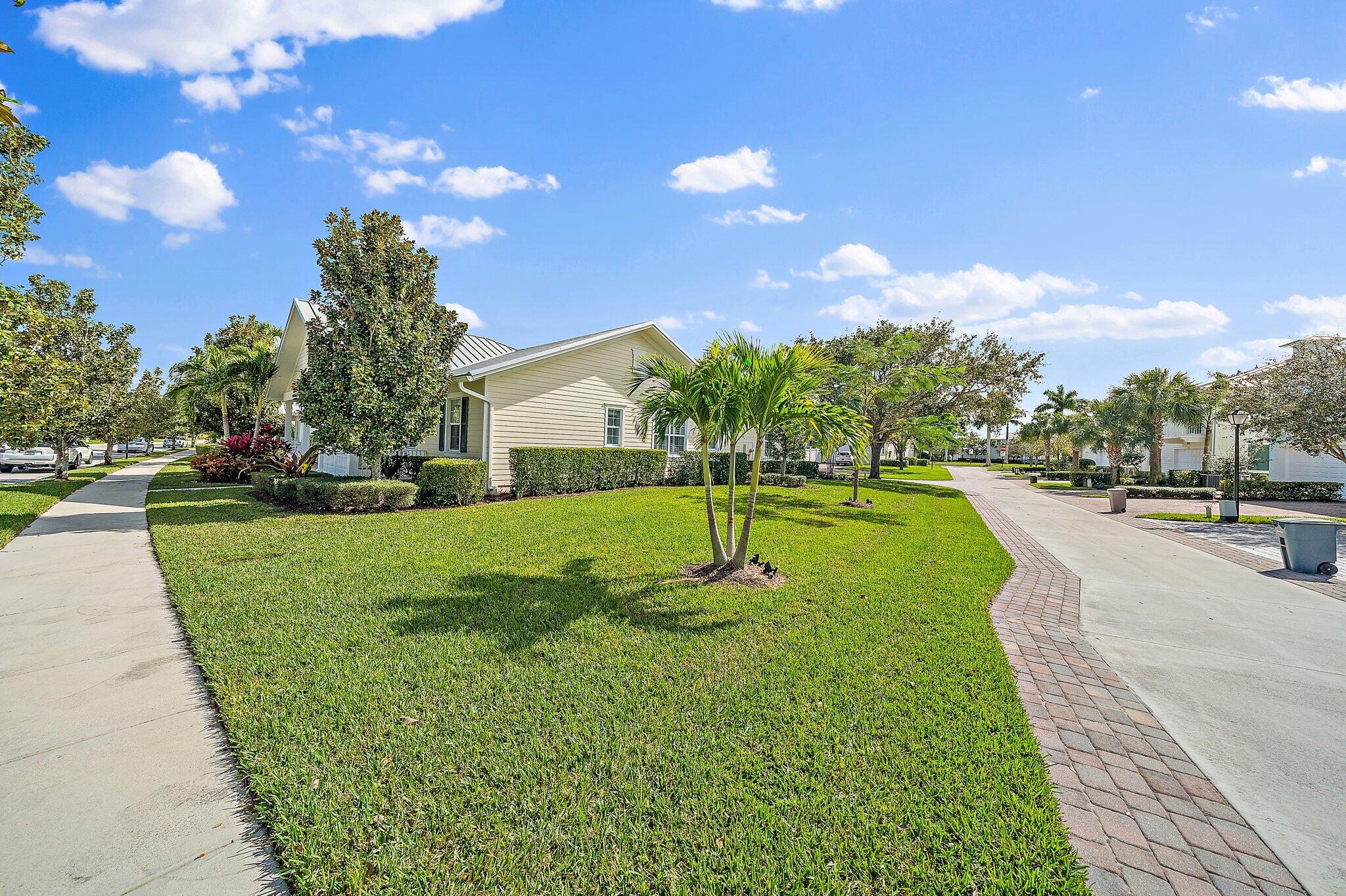 1174 Tropical Drive Jupiter, FL 33458 - Photo 4 of 49 Corner Lot