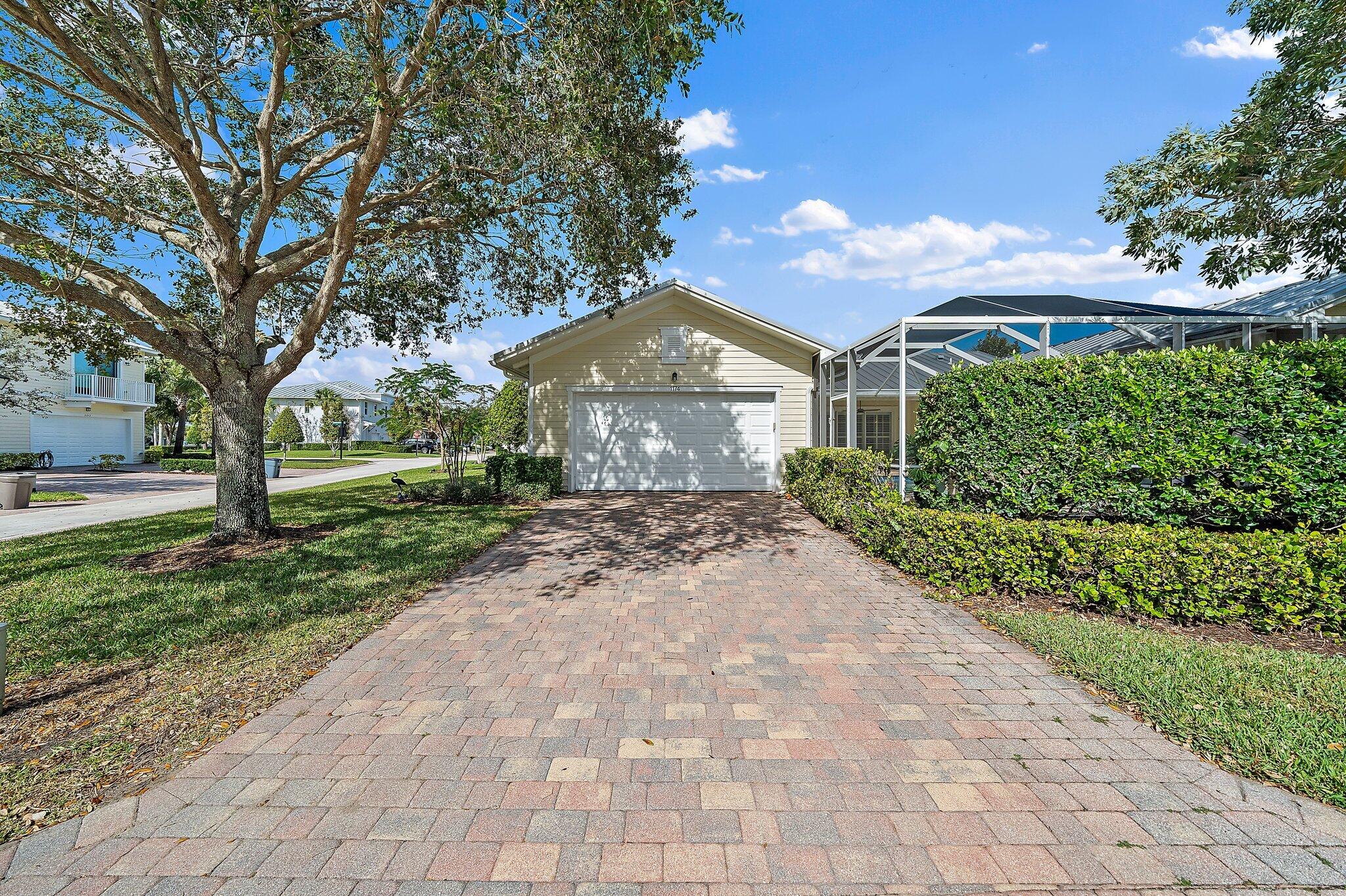 1174 Tropical Drive Jupiter, FL 33458 - Photo 6 of 49 Exterior Back