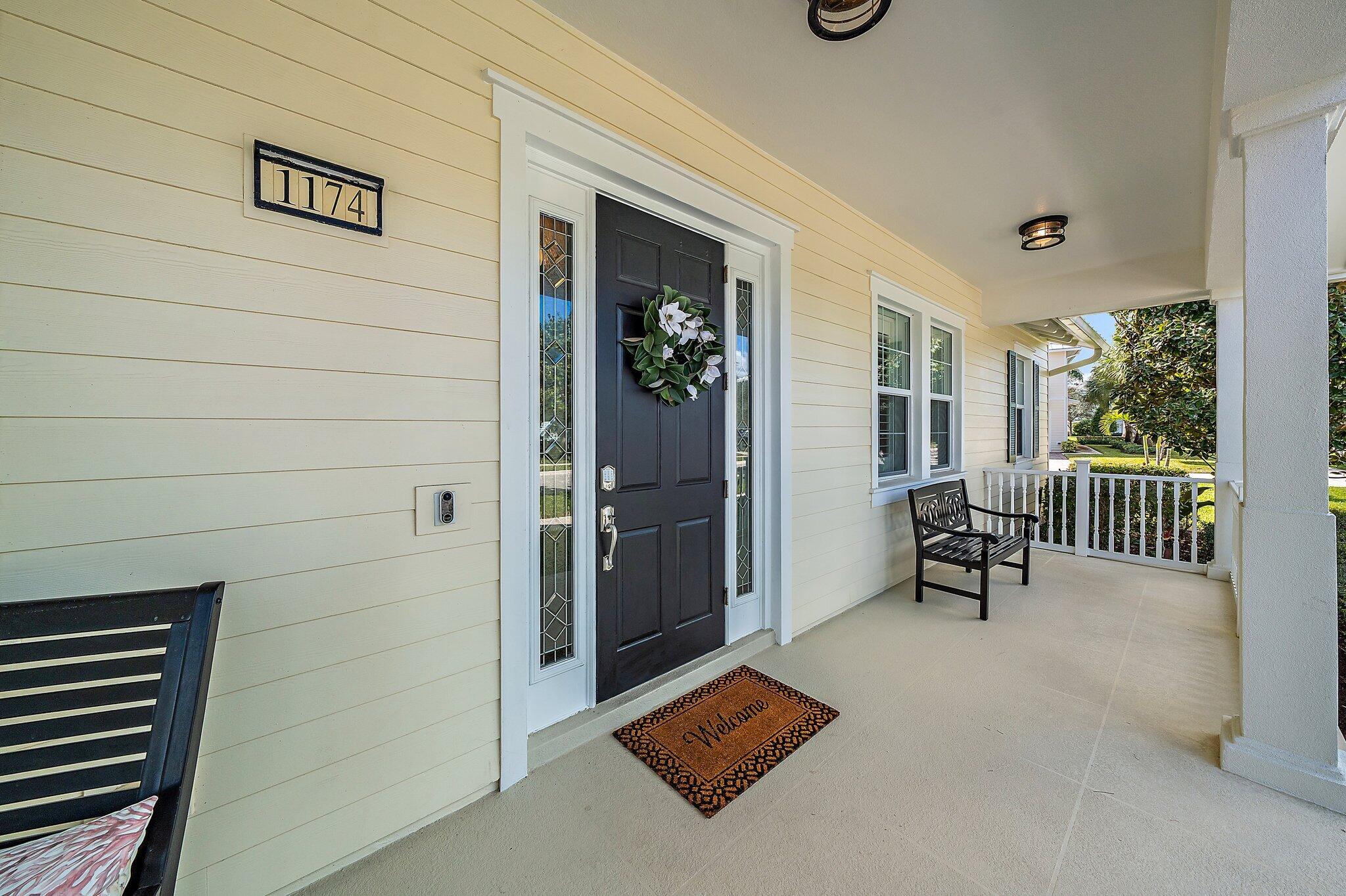 1174 Tropical Drive Jupiter, FL 33458 - Photo 8 of 49 Front Porch