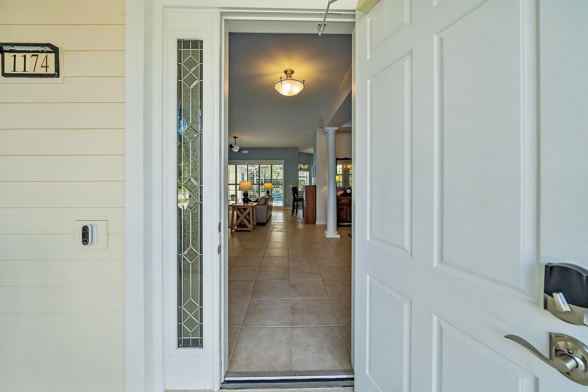 1174 Tropical Drive Jupiter, FL 33458 - Photo 9 of 49 Entrance