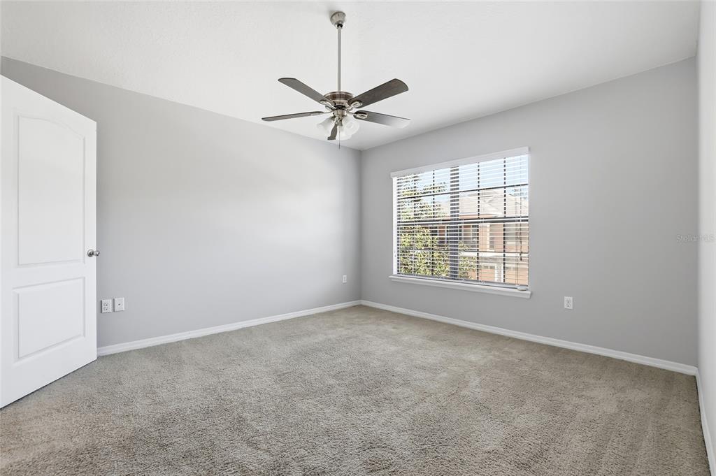 5723 Kingletsound Lithia, FL 33547 - Photo 21 of 33 a view of an empty room with a window