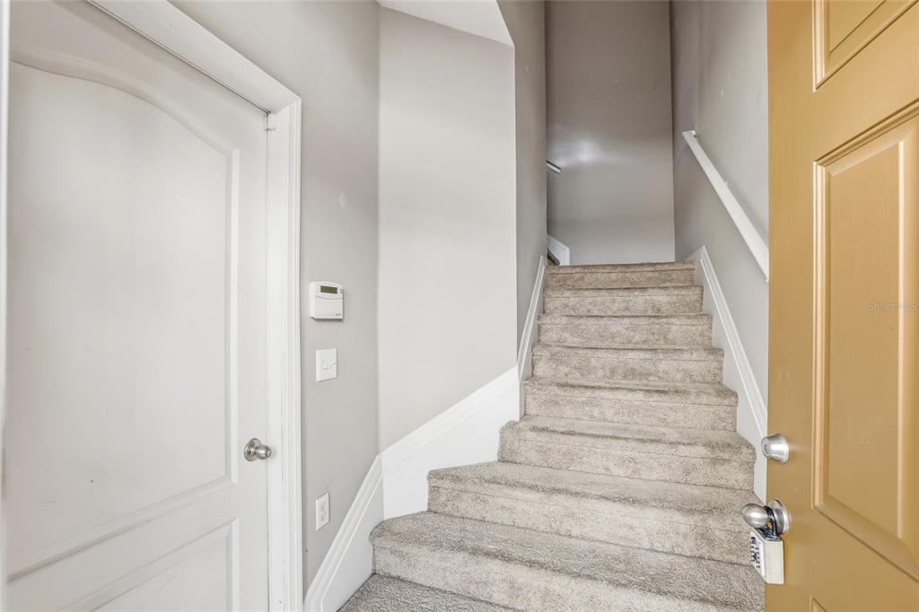 5723 Kingletsound Lithia, FL 33547 - Photo 6 of 33 a view of staircase with white walls