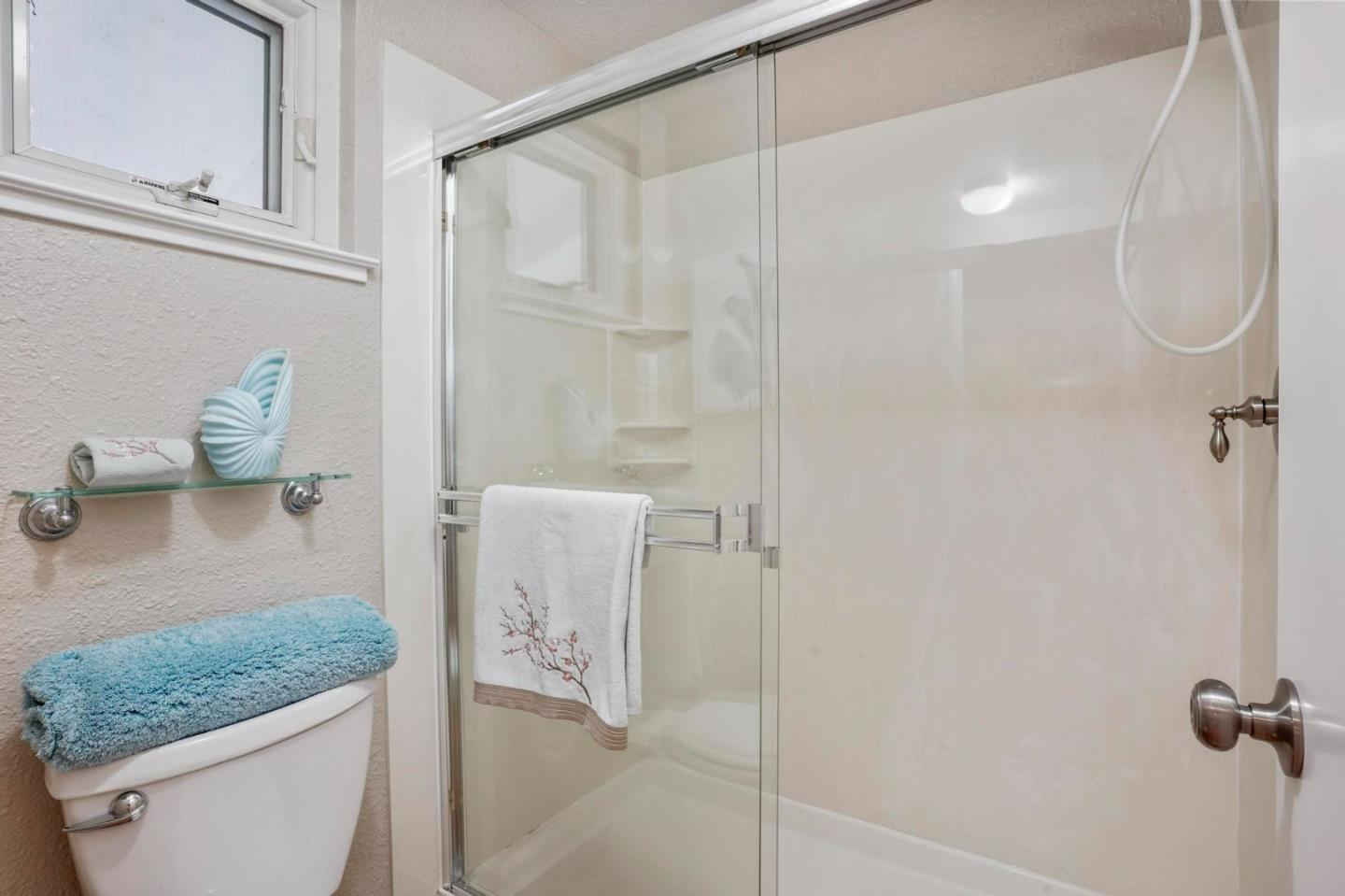 120 Castleton Court San Ramon, CA 94583 - Photo 20 of 30 a bathroom with a granite countertop sink a toilet and shower