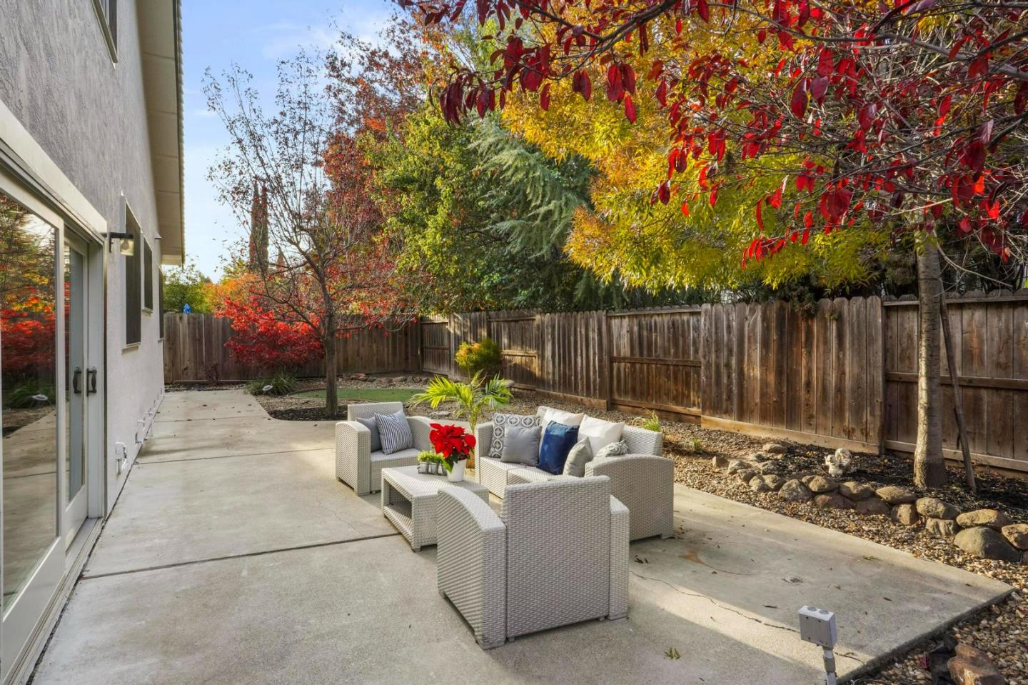 120 Castleton Court San Ramon, CA 94583 - Photo 26 of 30 a view of a patio with couches and table and chairs and wooden fence