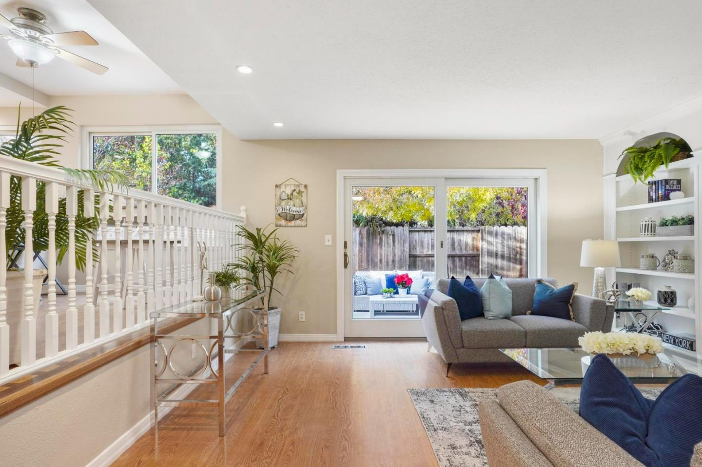 120 Castleton Court San Ramon, CA 94583 - Photo 10 of 30 a living room with furniture and a large window with potted plants