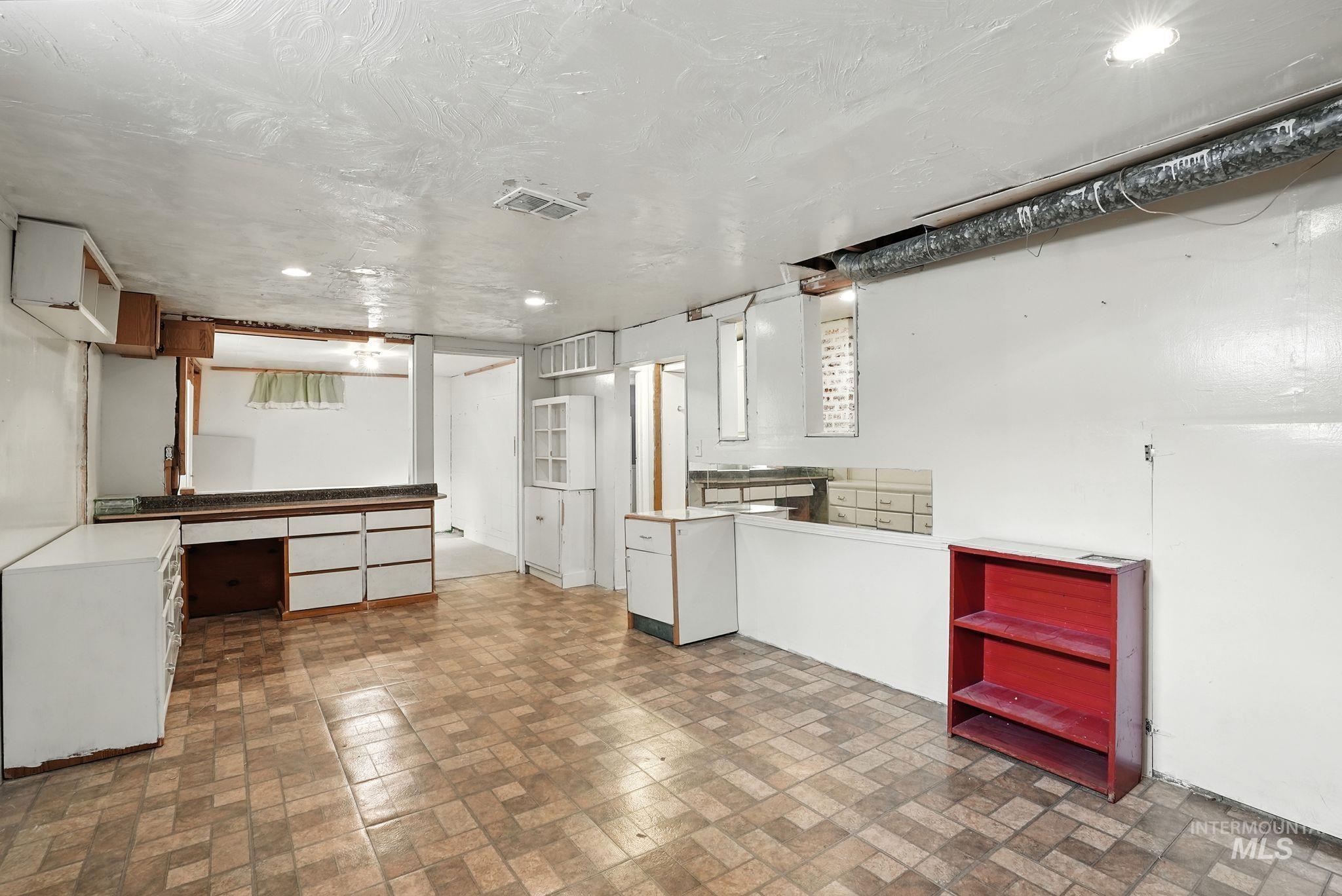 3506 10th Street Lewiston, ID 83501 - Photo 26 of 40 Finished basement with brick patterned floors