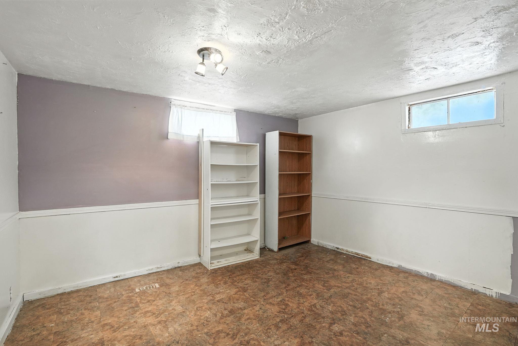 3506 10th Street Lewiston, ID 83501 - Photo 30 of 40 Basement with a textured ceiling and baseboards