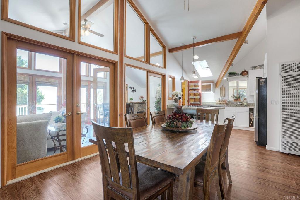 22223 Crestline Road Palomar Mountain, CA 92060 - Photo 63 of 90 a view of a dining room with furniture window and wooden floor