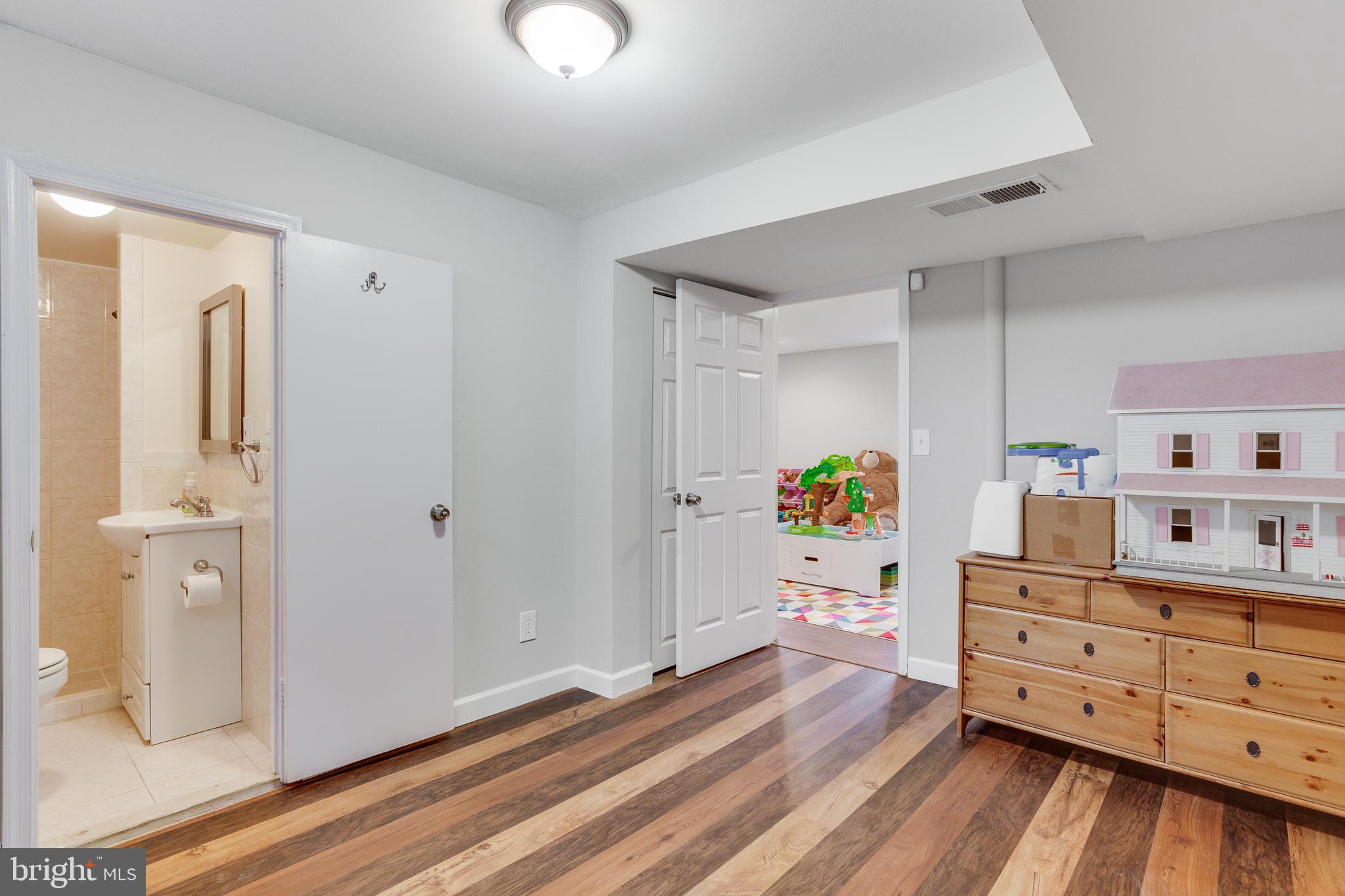 13307 Galvez Street Silver Spring, MD 20906 - Photo 22 of 32 Bedroom 5, with it's own bathroom, new floors!
