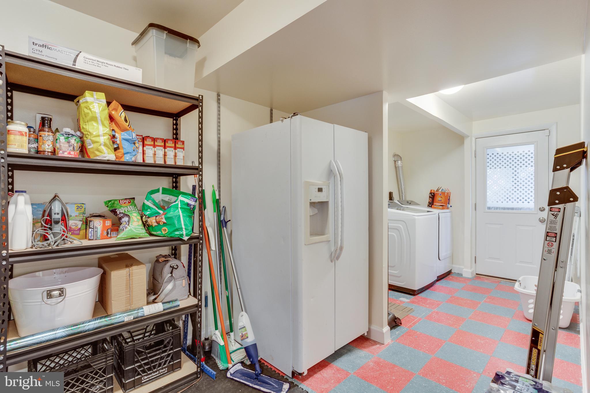 13307 Galvez Street Silver Spring, MD 20906 - Photo 28 of 32 Lots of storage, spacious and well lit Laundry