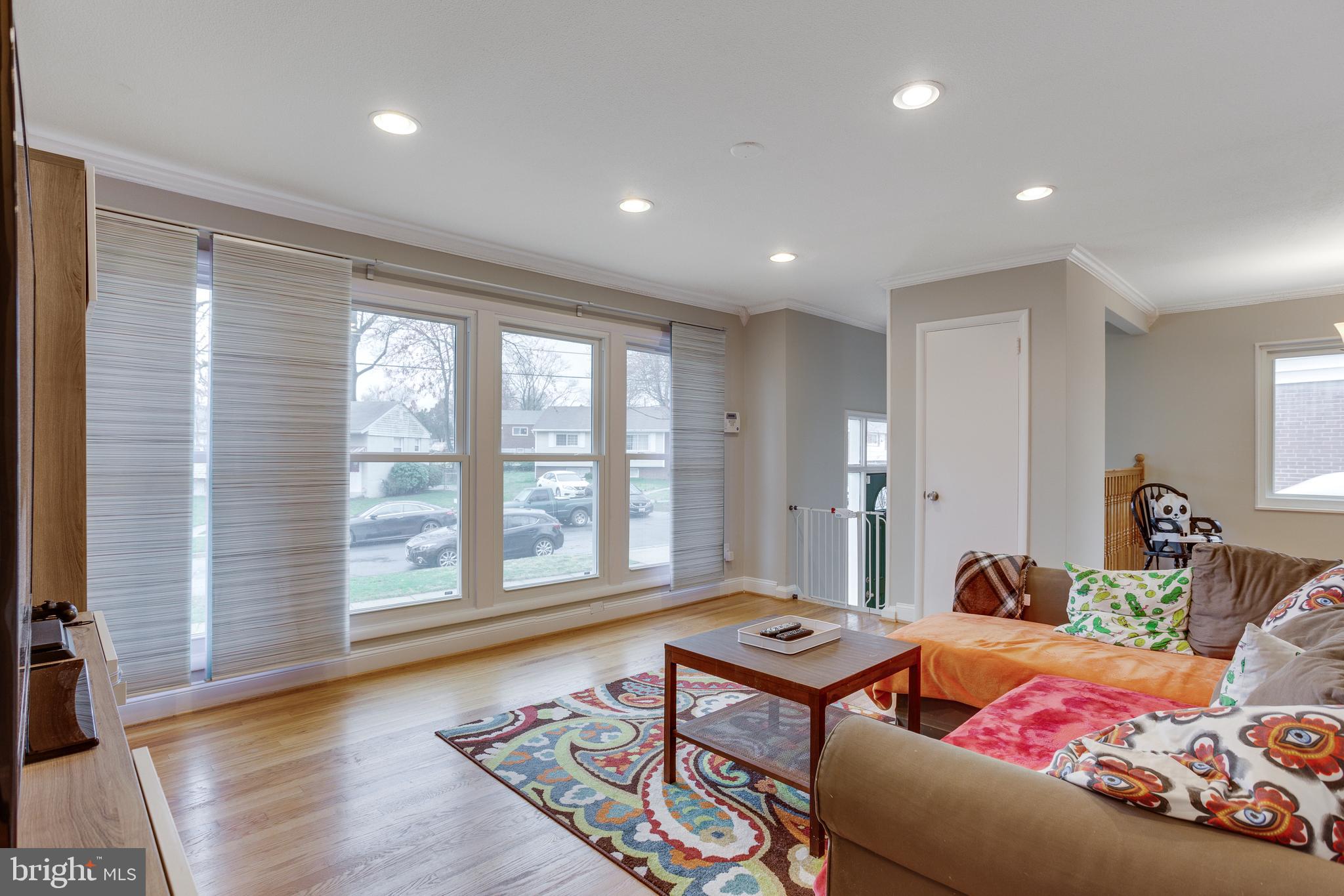 13307 Galvez Street Silver Spring, MD 20906 - Photo 5 of 32 Light-filled Living Room, large new windows