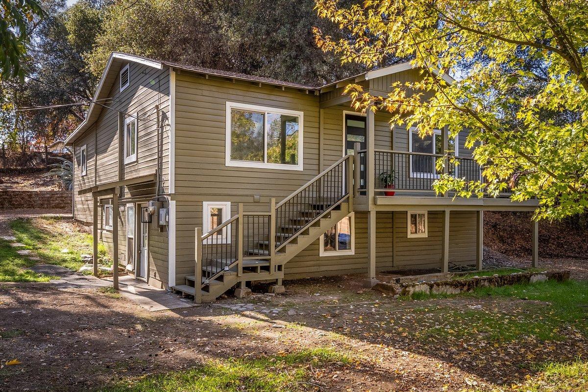 6310 Pleasant Valley Road El Dorado, CA 95623 - Photo 1 of 1 a view of a house with a yard